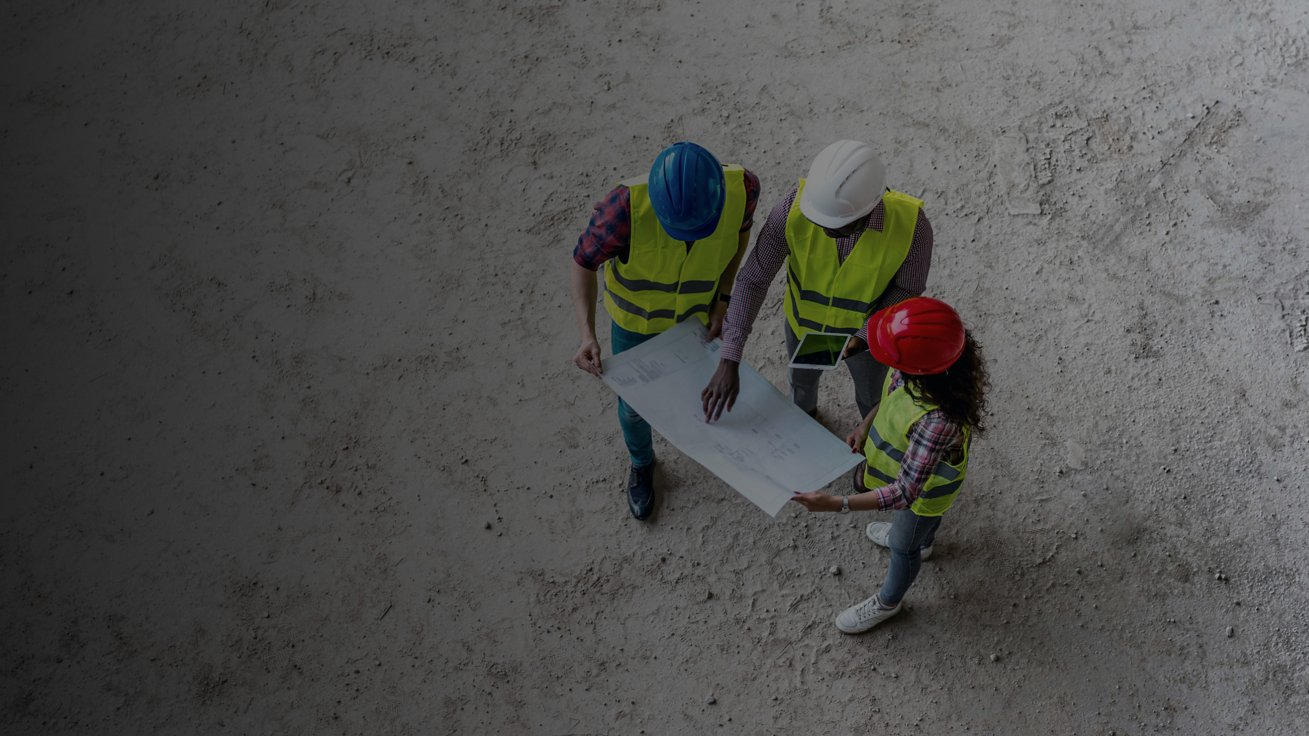 Construction professionals reviewing project plans